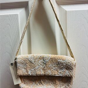 Anthropologie Tan and Cream Beaded Clutch